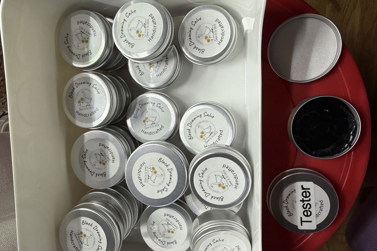 a container with round silver containers